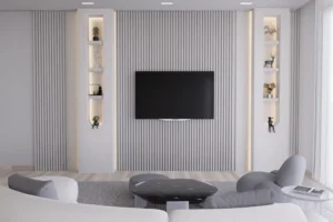 Modern living room with a media wall creating a clear visual focal point around the TV.