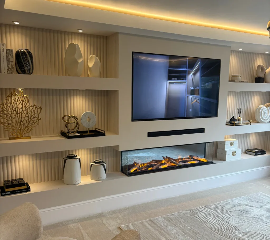 Modern media wall design in a contemporary living room with integrated television and soft LED lighting