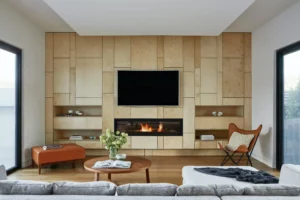 A space-efficient slimline fireplace media wall design tailored for a small living room in a modern UK apartment.